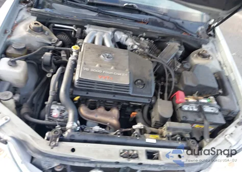 2000 Toyota Avalon z USA, uszkodzony, nr VIN 4T1BF2889YU111557